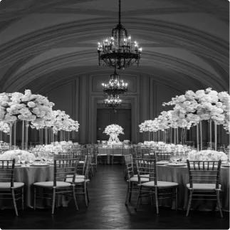 Elegant monochrome banquet hall set for a large event
